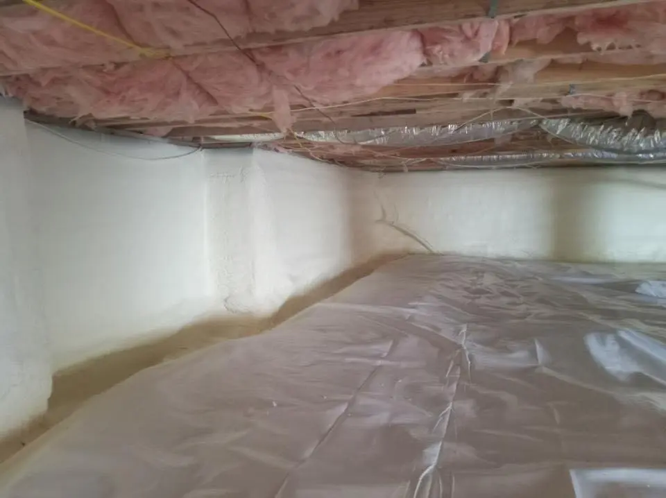 Crawl space encapsulation with closed-cell spray foam for Roof Waterproofing in Hurricane